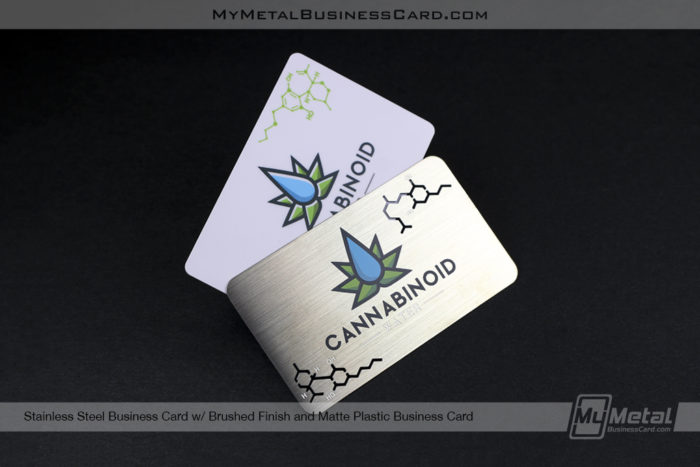 Matte Plastic Business Card And Metal Stainless Steel Business Card For Cannabis Company Against A Black Background