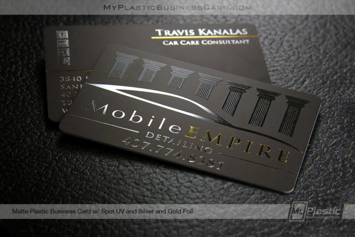 Matte Plastic With Gold Foil Business Cards And Gloss Uv For Added Wow Factor. Black Card On Black Background With Shining Foil Reflection